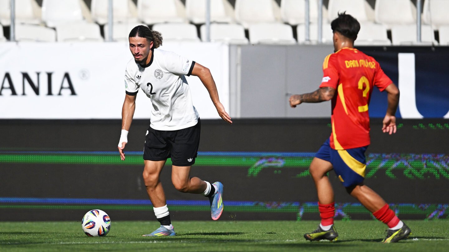 Taylan Bulut on the ball against Spain.