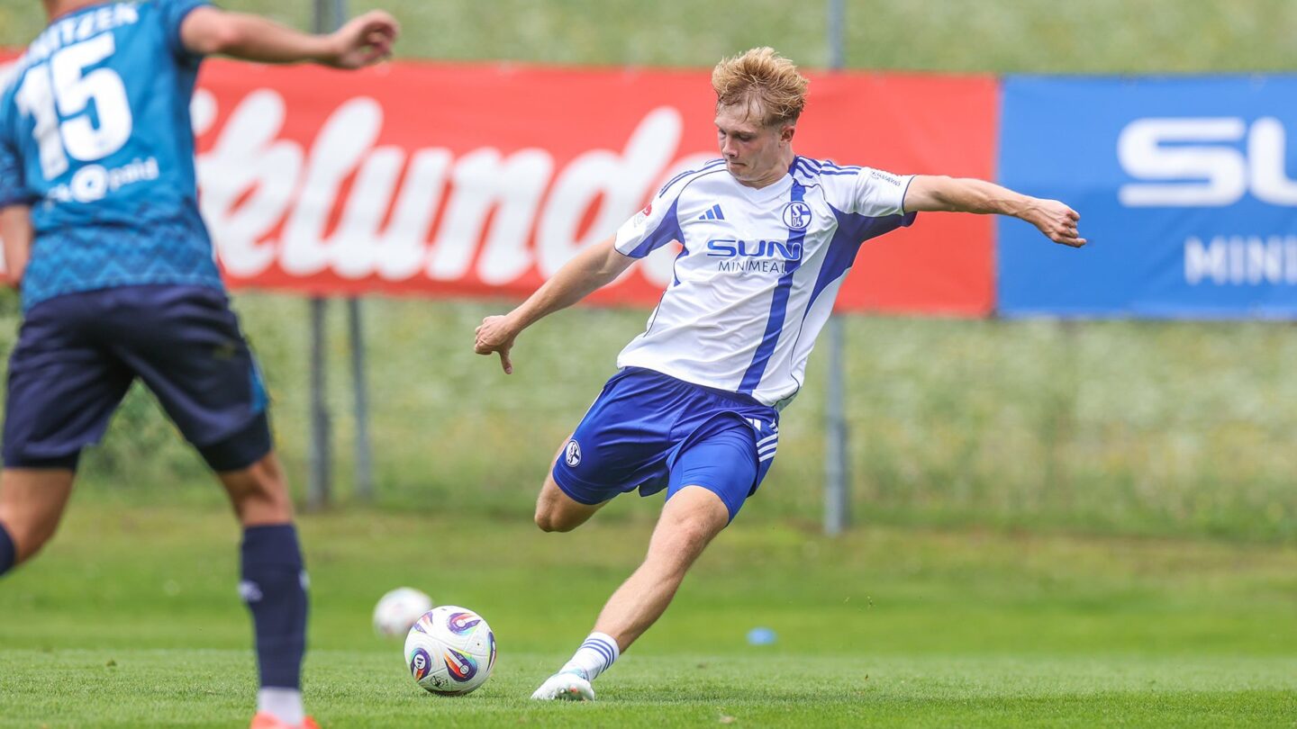 Peter Remmert shoots to pull a goal back against Wiesbaden